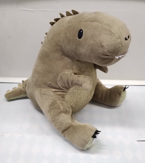 Plyšový dinosaurus s nahřívací sáčkem