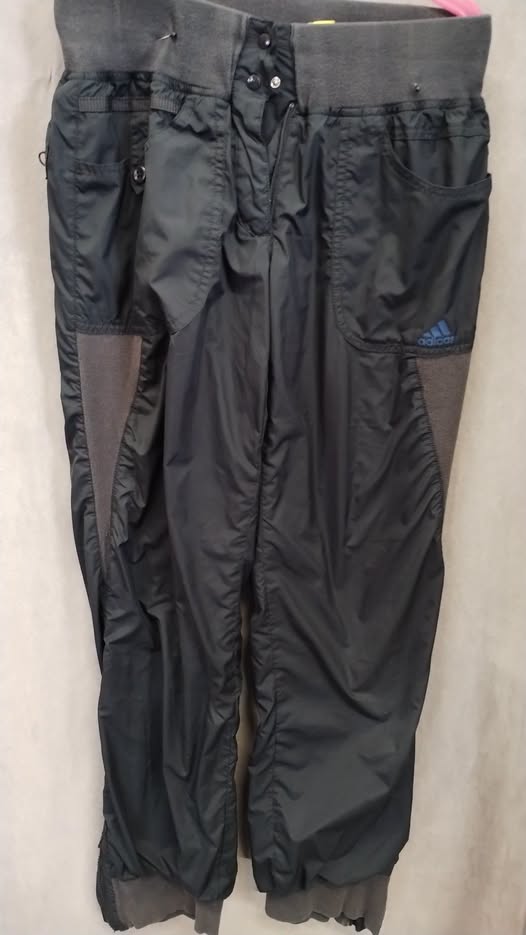 Slabé šusťakové kalhoty Adidas